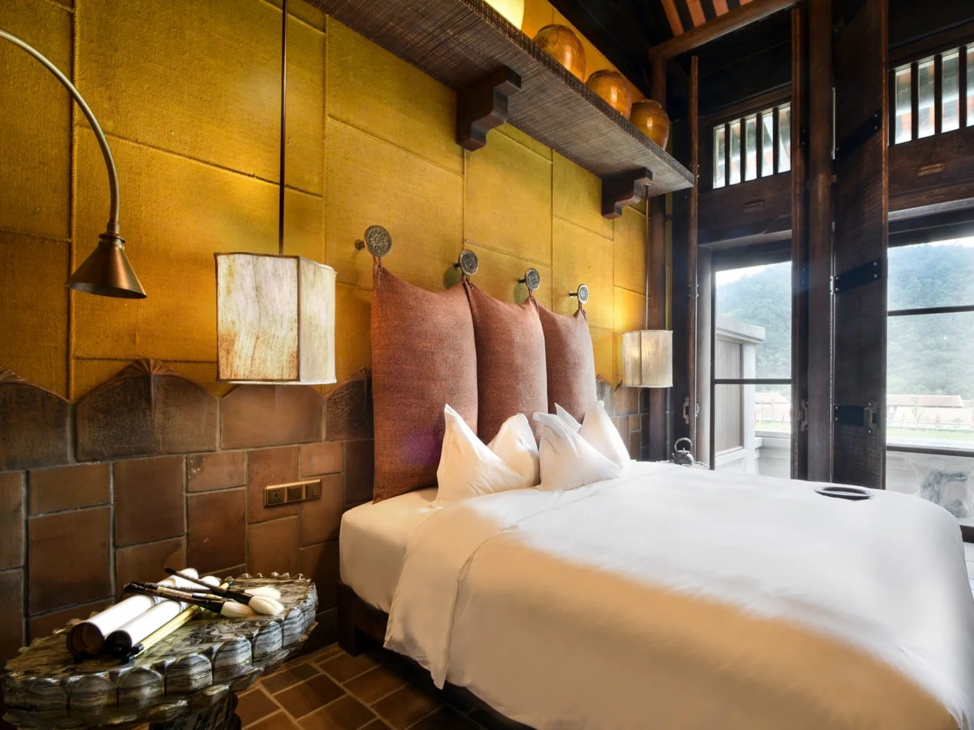 Official MGallery photograph of a Deluxe King Room with forest view at Legacy Yên Tử