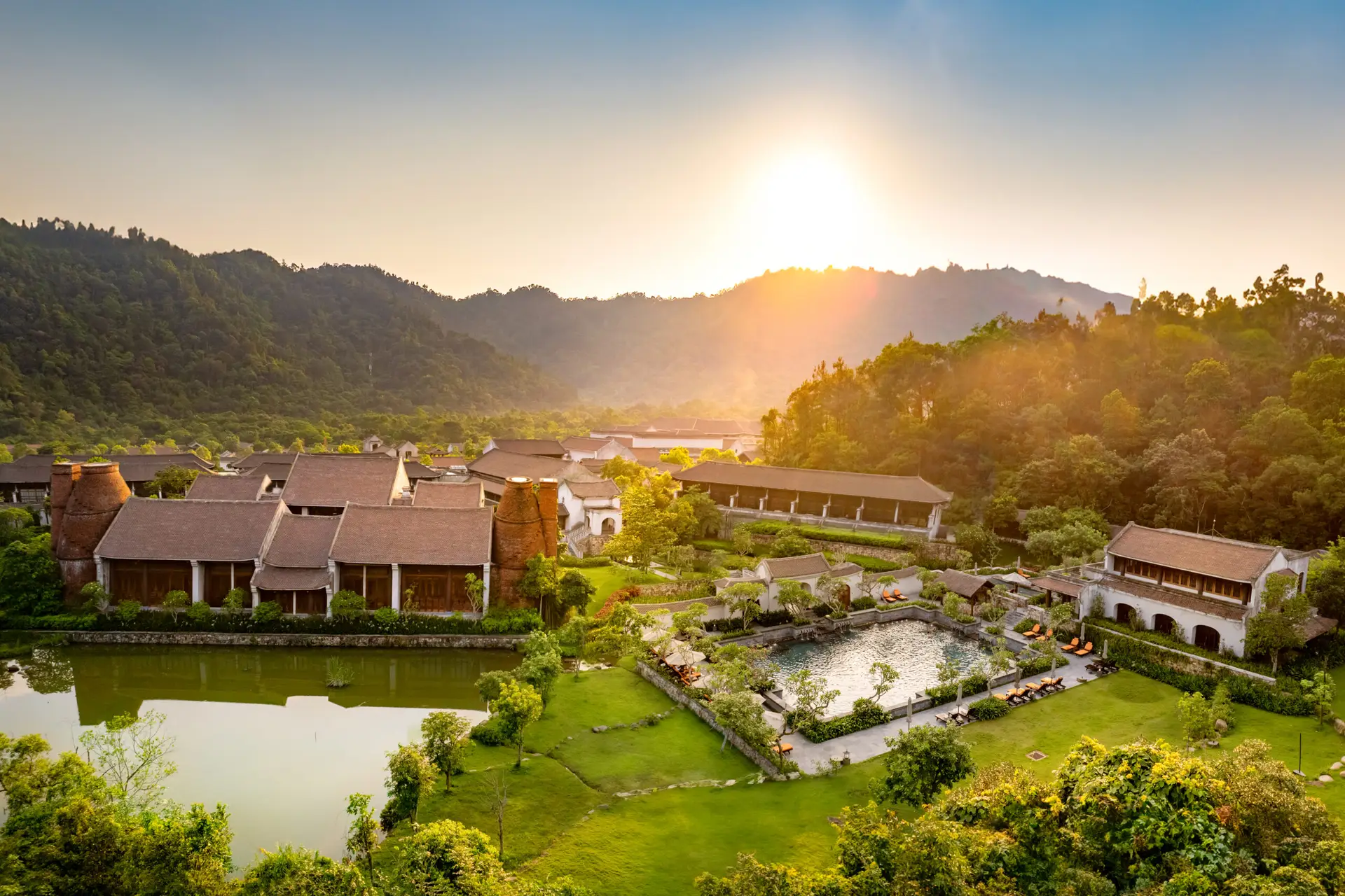 A panoramic mountain view over Legacy Yên Tử at sunrise
