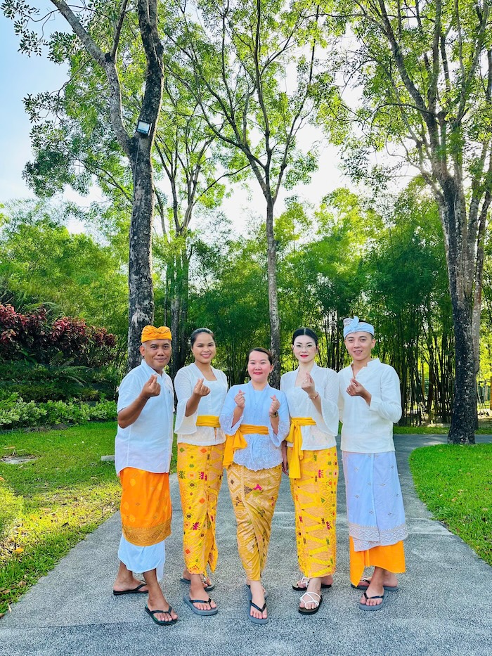 Alba Wellness team in Balinese outfit