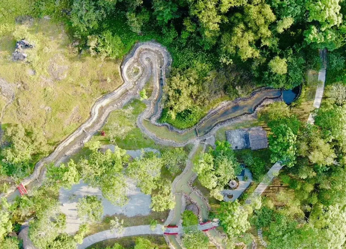 Aerial view of the hot spring paths at Alba Wellness Valley Hue