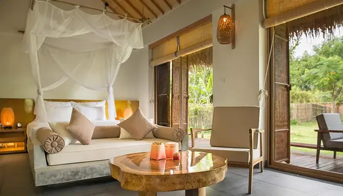 Bungalow lounge and bedroom at Alba Wellness Valley Hue for the Yên Retreat