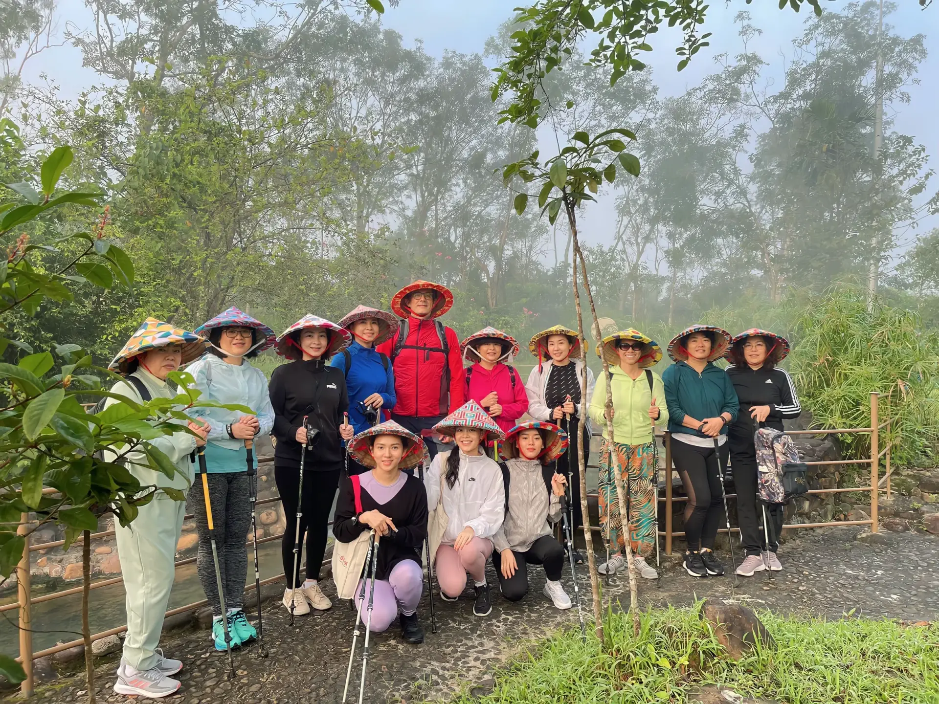 Guests walking through nature at Alba Wellness Valley Hue