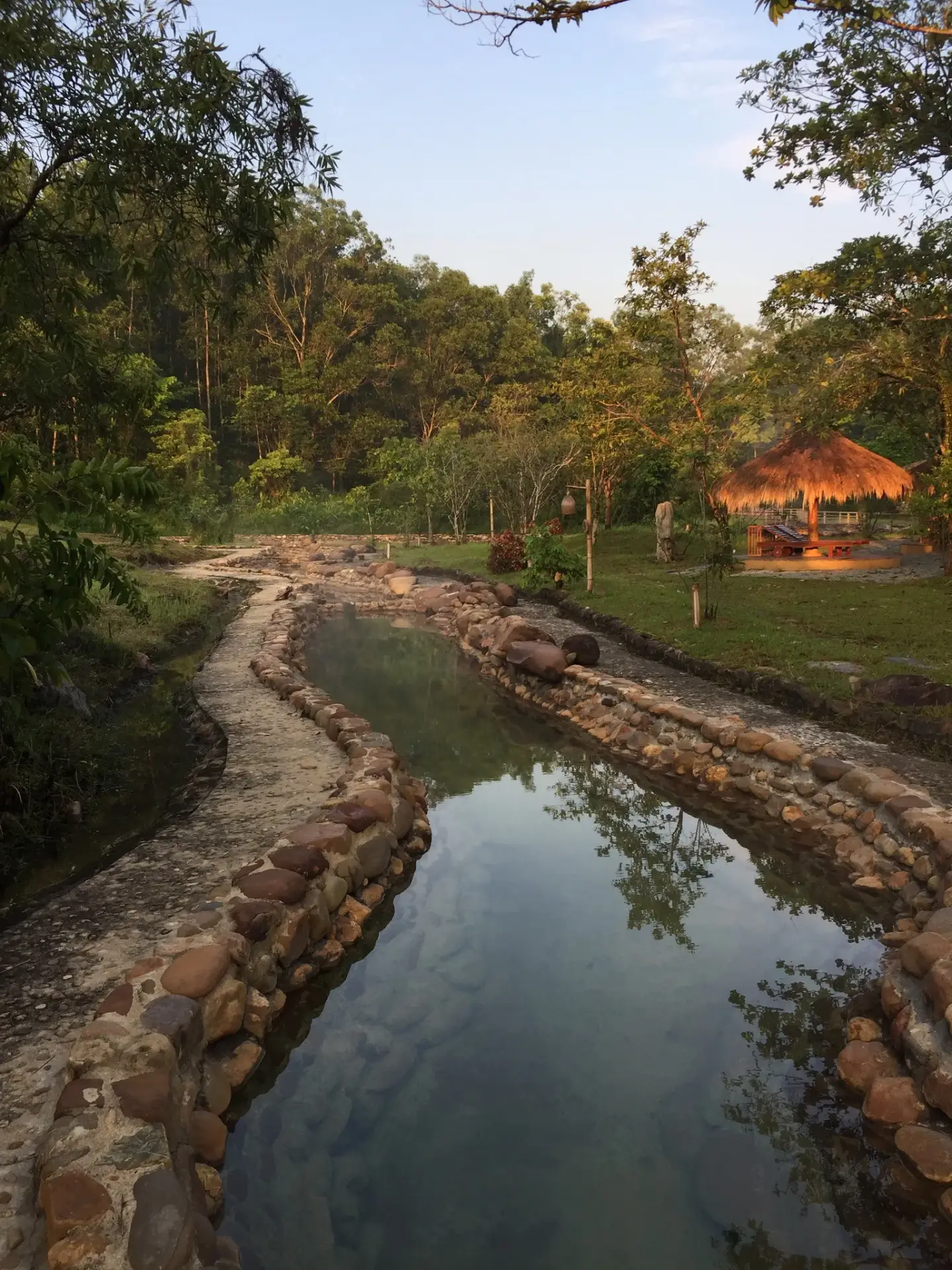 Quiet mineral hot spring channel at Alba Wellness Valley Huế